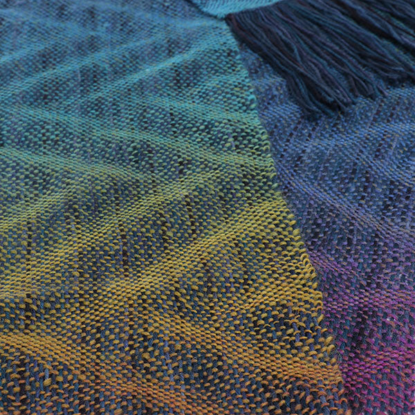 BØLGEFORMEDE VÆVESKYTTER