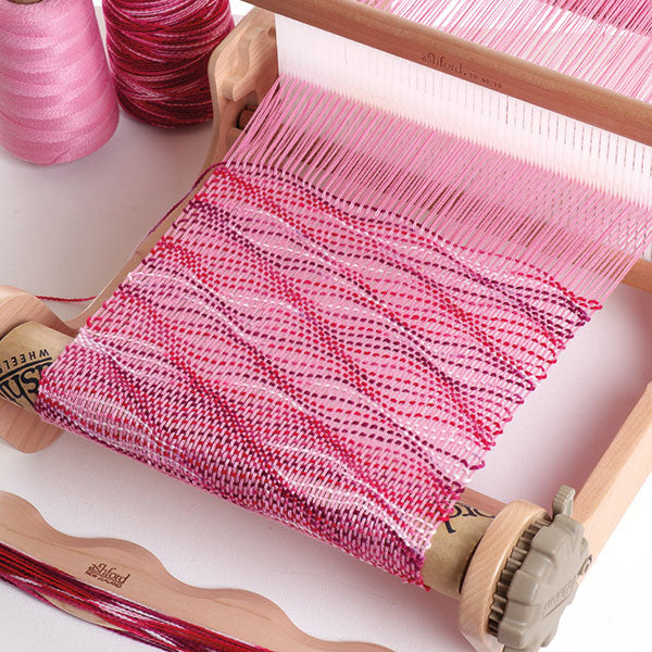 BØLGEFORMEDE VÆVESKYTTER